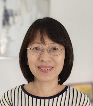 Headshot of Yongqiang Liu - shoulder length brown hair and glasses